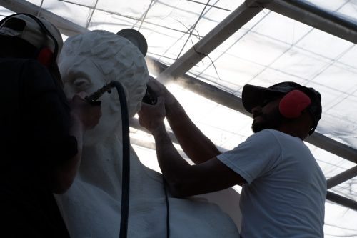 Nicola Antonelli and Stefano Faccini work on the monument to Trentino La Barba 