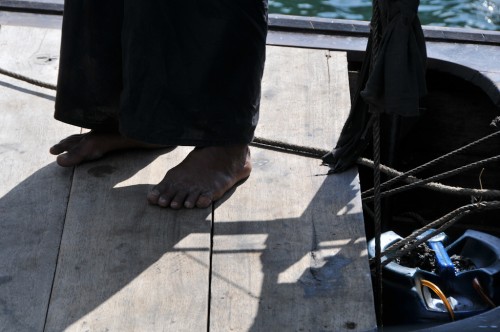 Feet on a boat