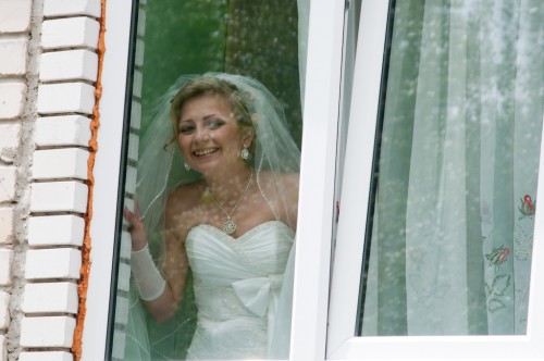 BRIDE AT THE WINDOW