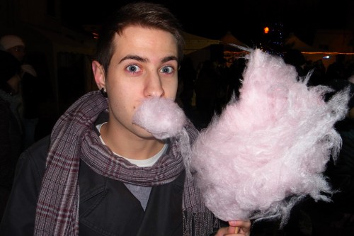 Matteo eats cotton candy pink