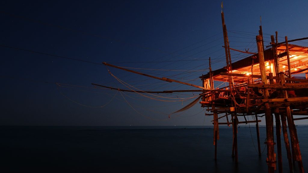 RED TRABOCCO IN THE BLUE NIGHT