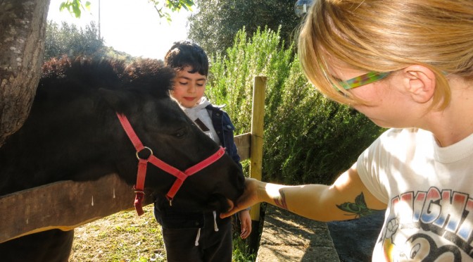 Rita kissing the hand of Valeria