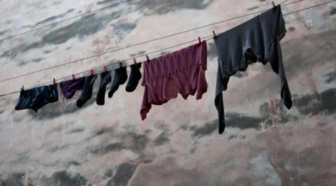 CLOTHES HANGING AT THE MAIN ENTRANCE