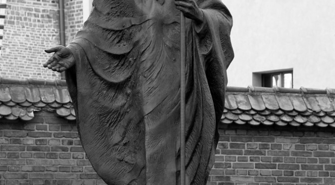 Statue of Pope Jonnaes Paulus II in front of the Wawel Cathedral in Krakow
