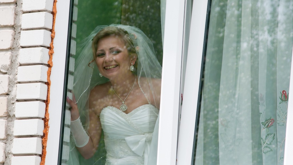 BRIDE AT THE WINDOW