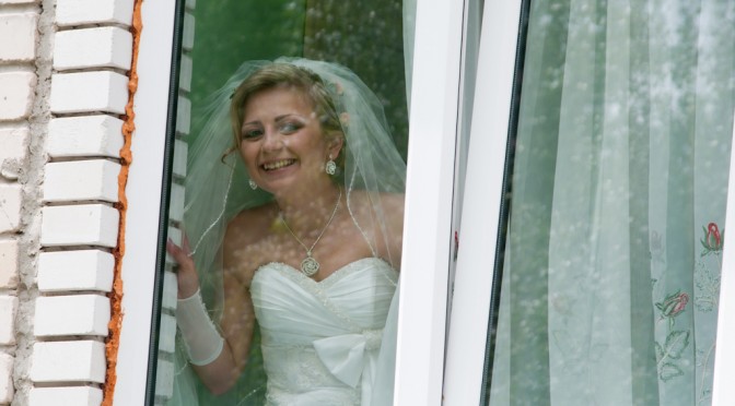 BRIDE AT THE WINDOW