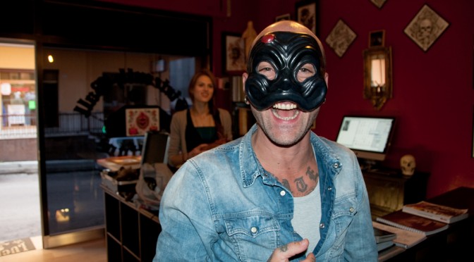MARCO BIONDI WEARING A HARLEQUIN MASK