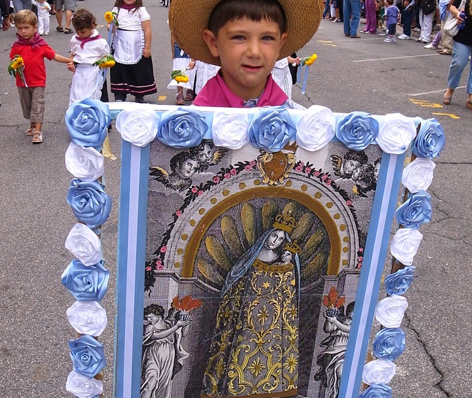 Boy devoted to the Madonna at the Gift