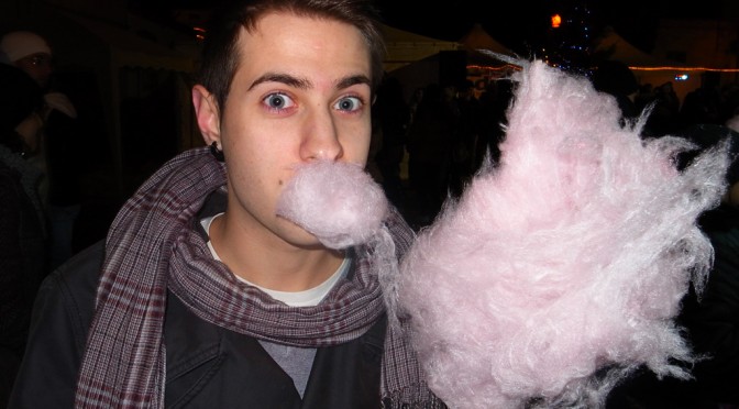 Matteo eats cotton candy pink