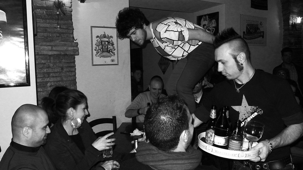 Luca Romagnoli jumps on the tables