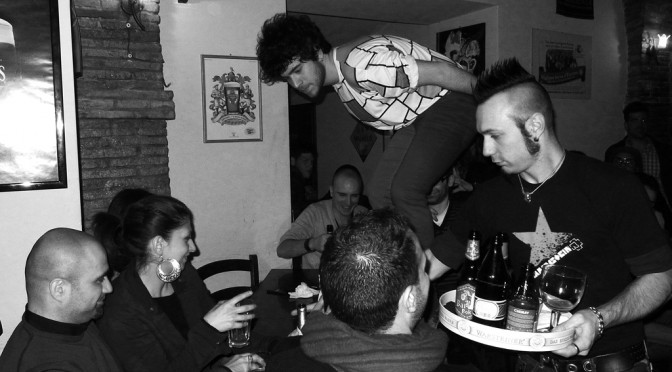 Luca Romagnoli jumps on the tables