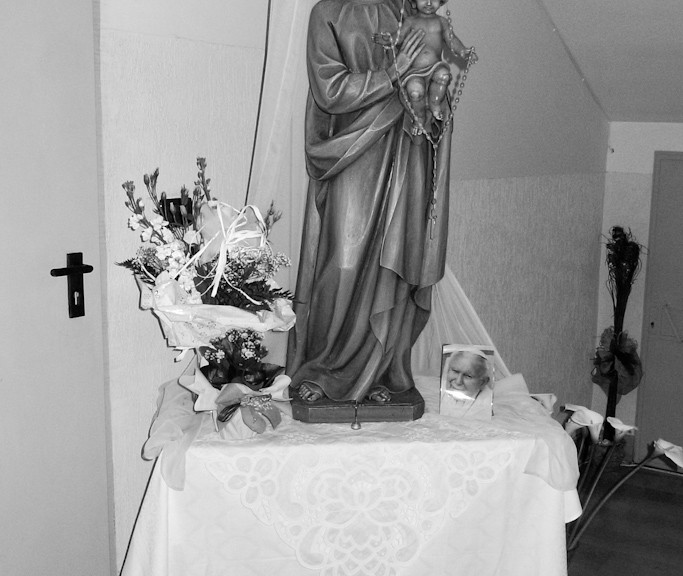 Virgin Mary under the stairs