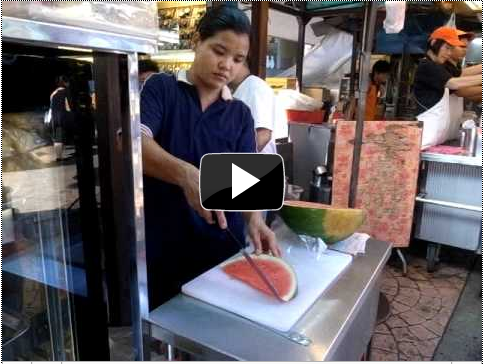 Cutting watermelon in Kuala Lumpur